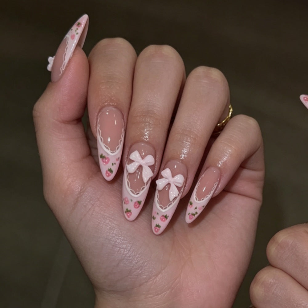 Elegant Stiletto Press-On Nails with Floral and Bow Accents Stornfield