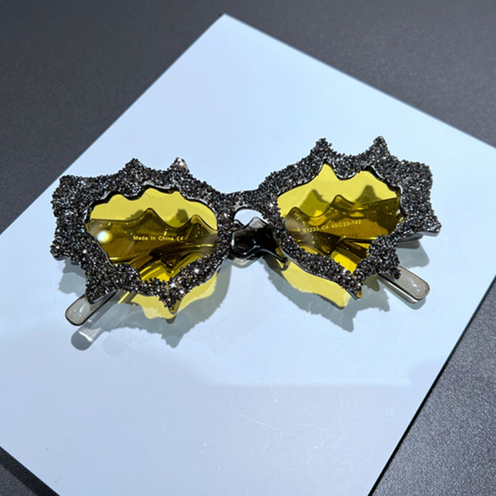 Ladies creative sunglasses in an extravagant design with glitter embellishments Stornfield