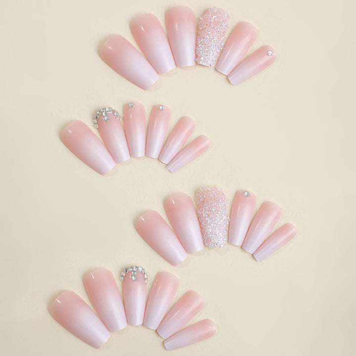 Artificial nail set with elegant glitter and flower decorations Stornfield