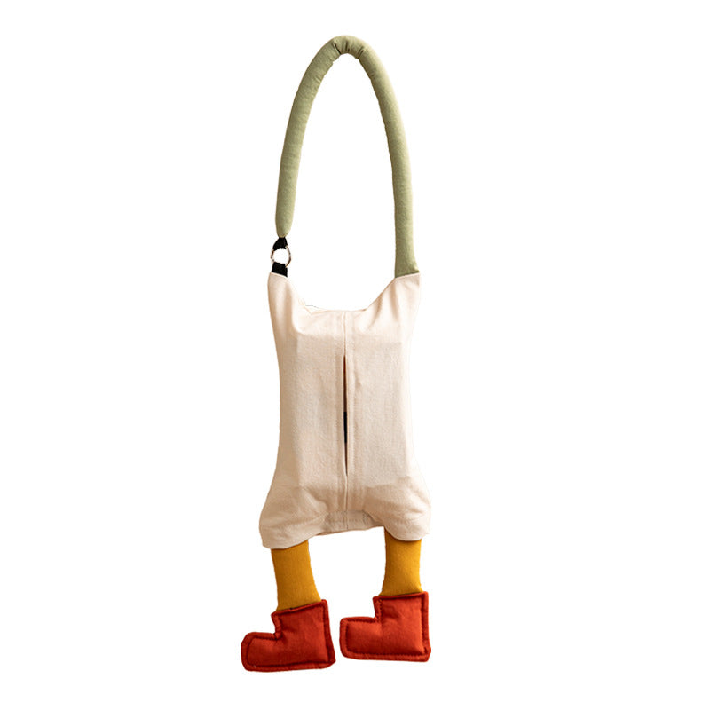 Shoulder bag with playful plush pendant and padded carrying handle