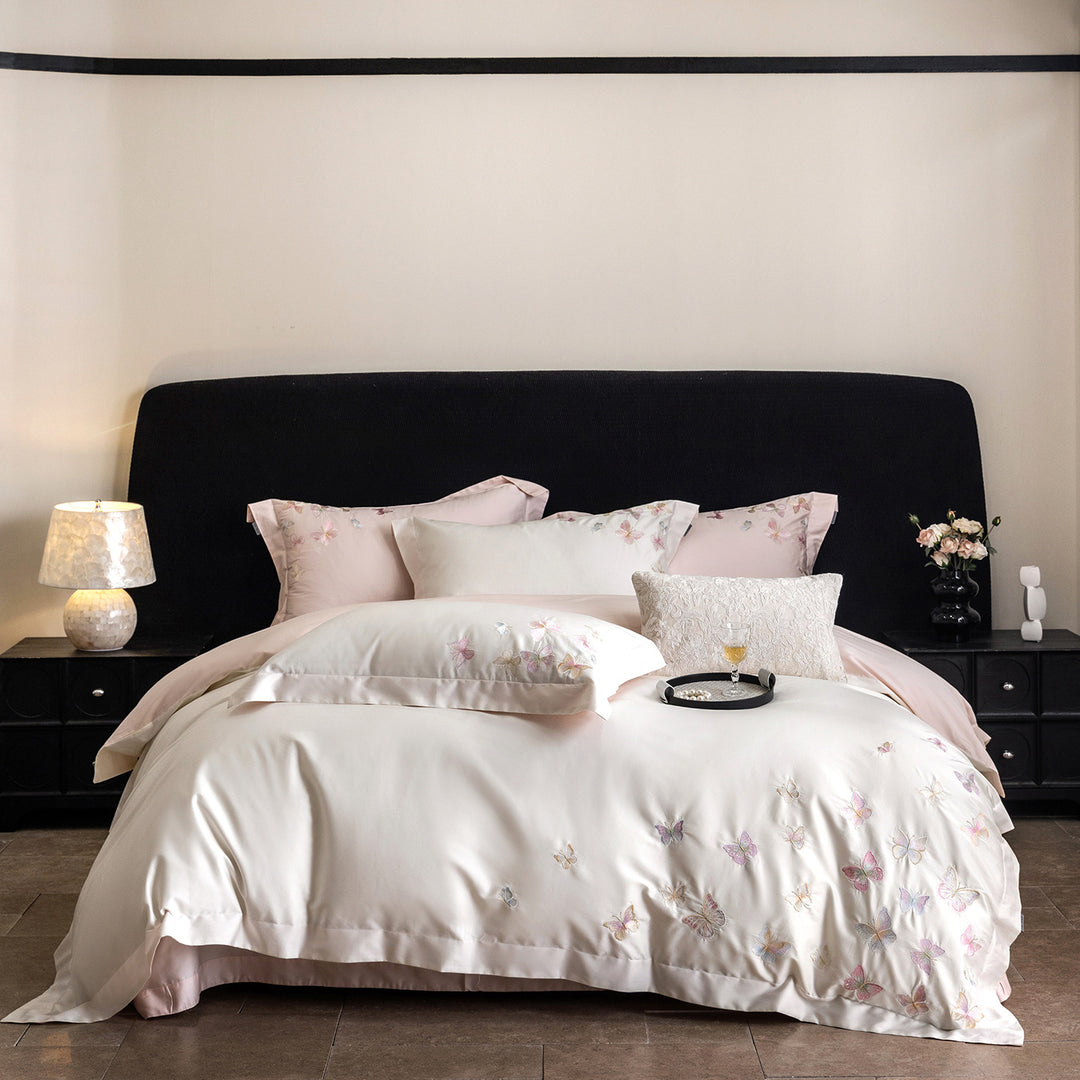 Premium bedding set made of extra soft cotton satin with delicate butterfly embroidery and concealed hotel closure