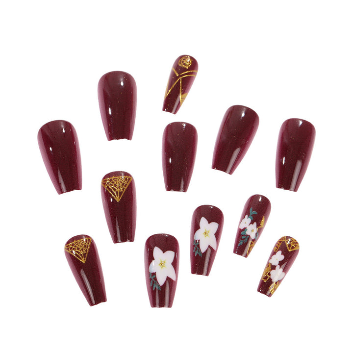 Trendy artificial nails with floral accents Stornfield