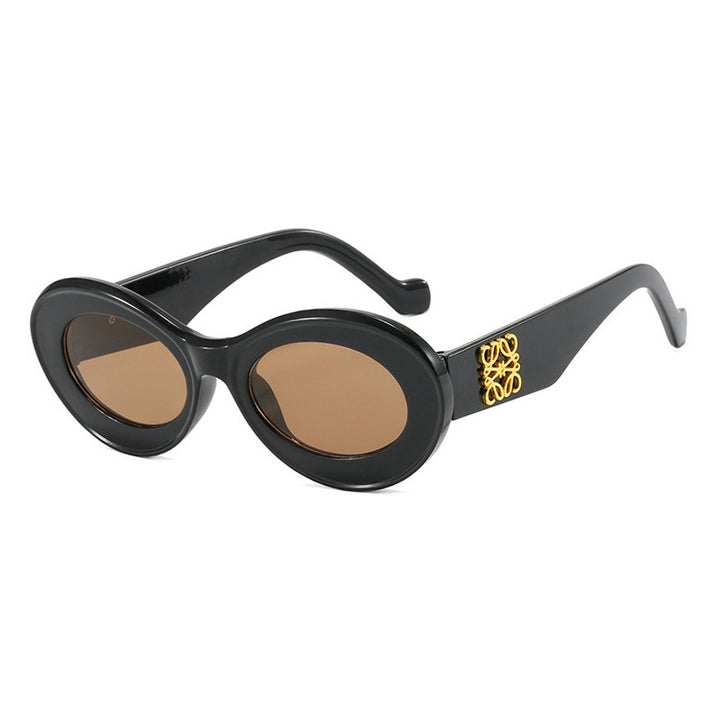 Women's fashionable sunglasses with oval frame and golden accents Stornfield