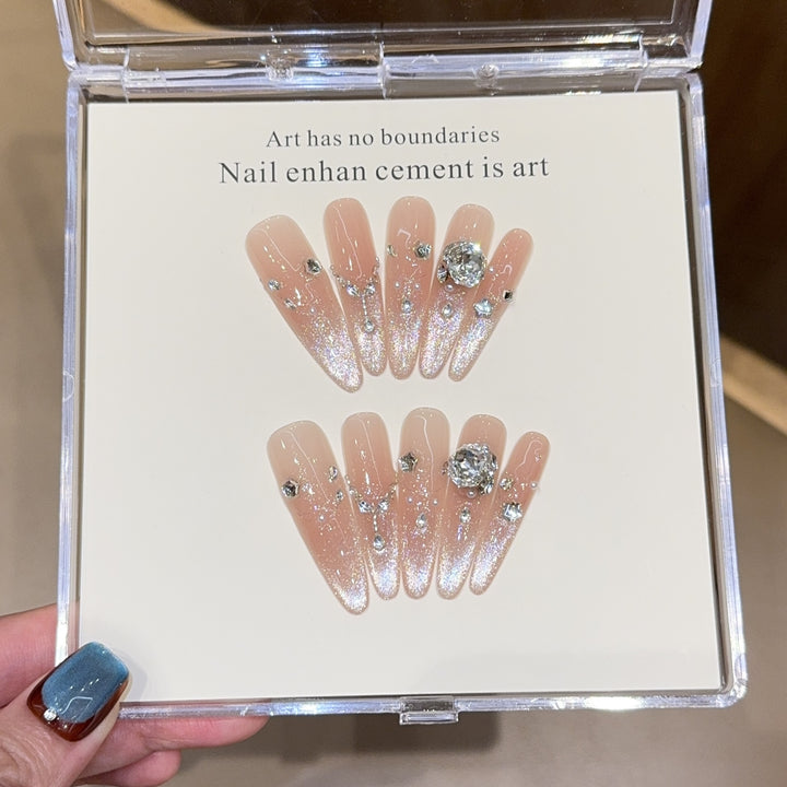Artificial artificial nails with luxurious glitter and rhinestone design Stornfield