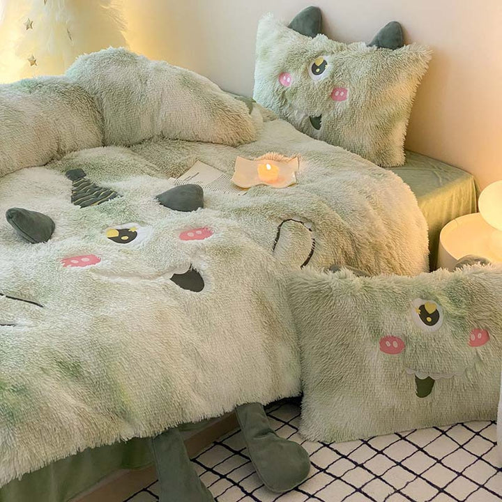 Plush bedding set with 3D monster appliqués and soft fleece