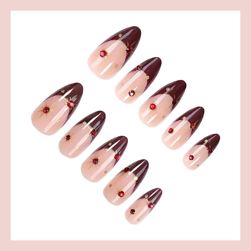 Acrylic nail set with glamorous embellishments and elegant accents Stornfield