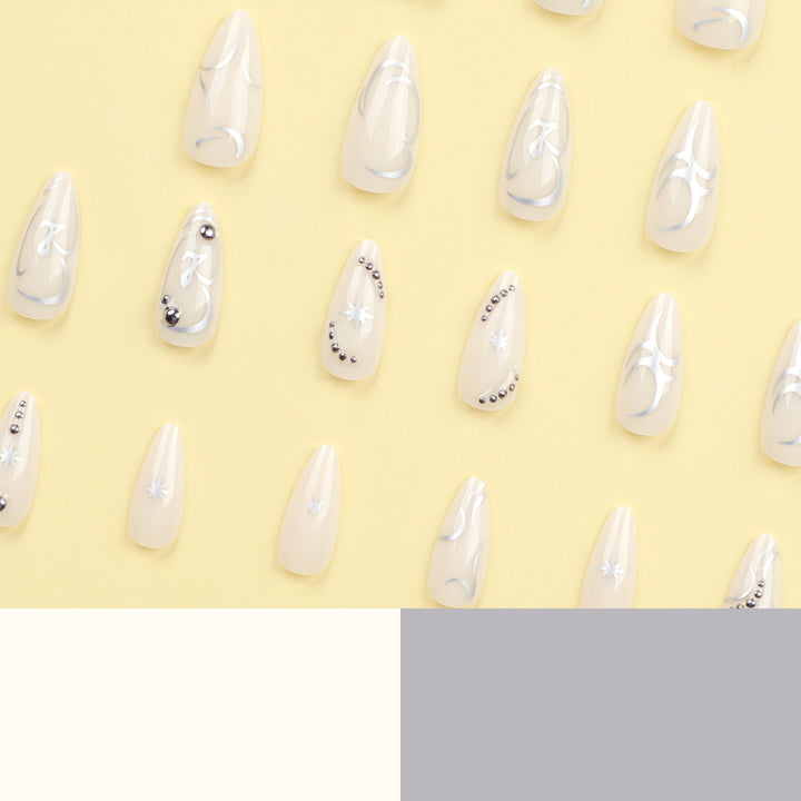 Artistic acrylic nails with elegant glitter patterns Stornfield