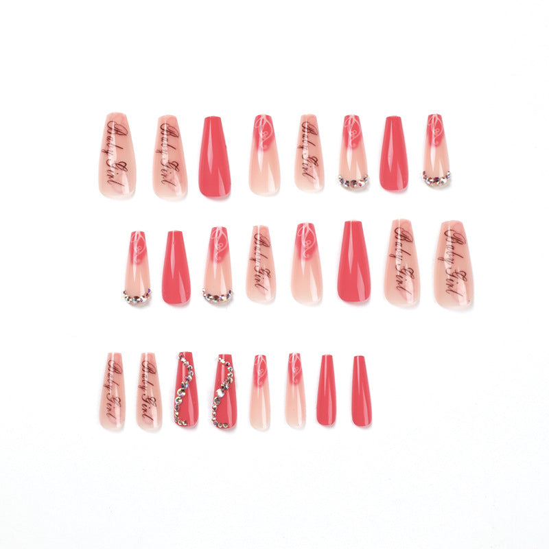 Artificial nail art with luxurious rhinestone and flower decorations Stornfield
