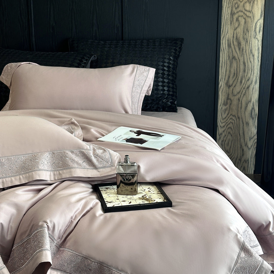 Premium cotton satin bedding set with integrated lace trim and delicate floral embroidery