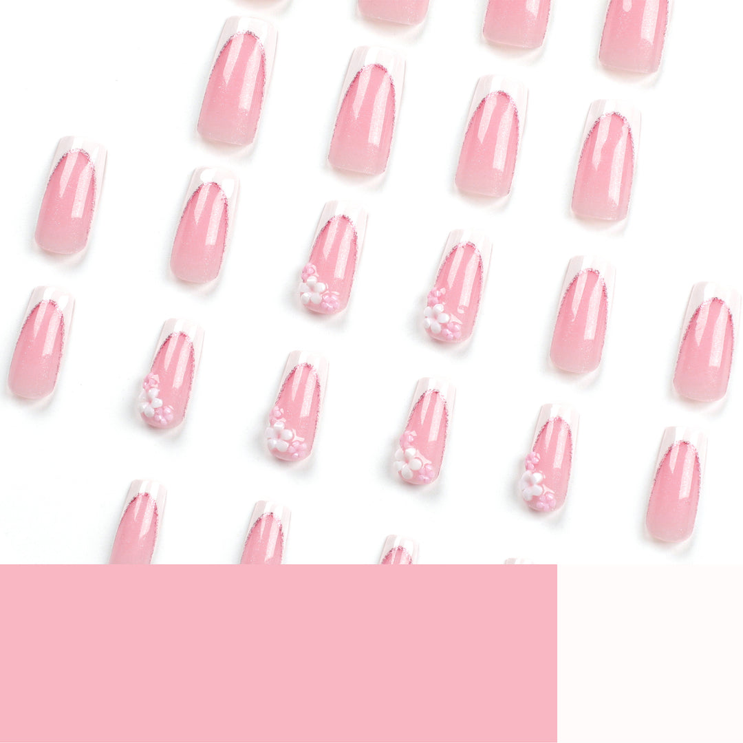 Artful Nail Extensions with Glitter and Flower Accents Stornfield