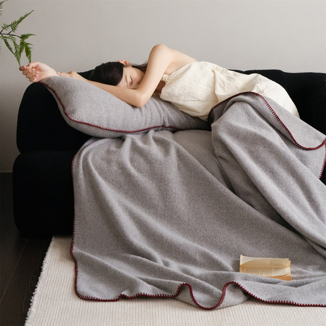 Premium wool blanket with fine hand-stitched edge and particularly soft drape