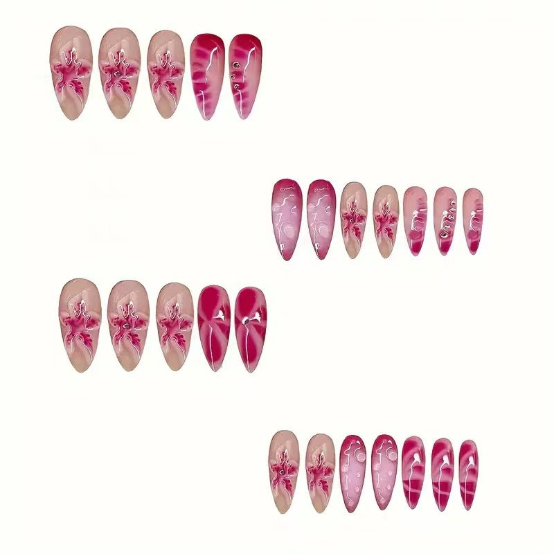 Artistic Stiletto Nail Enhancements with Intricate Floral Design Stornfield