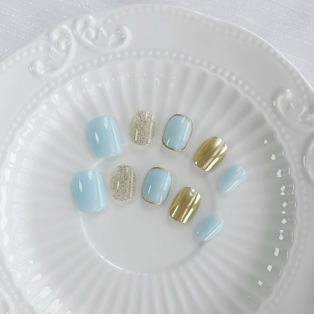 Artistic Press-On Nail Set with Glitter and Metallic Accents