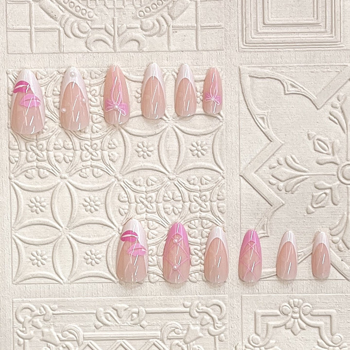 Artistic Press-On Nail Set with Kiss and Bow Design Stornfield