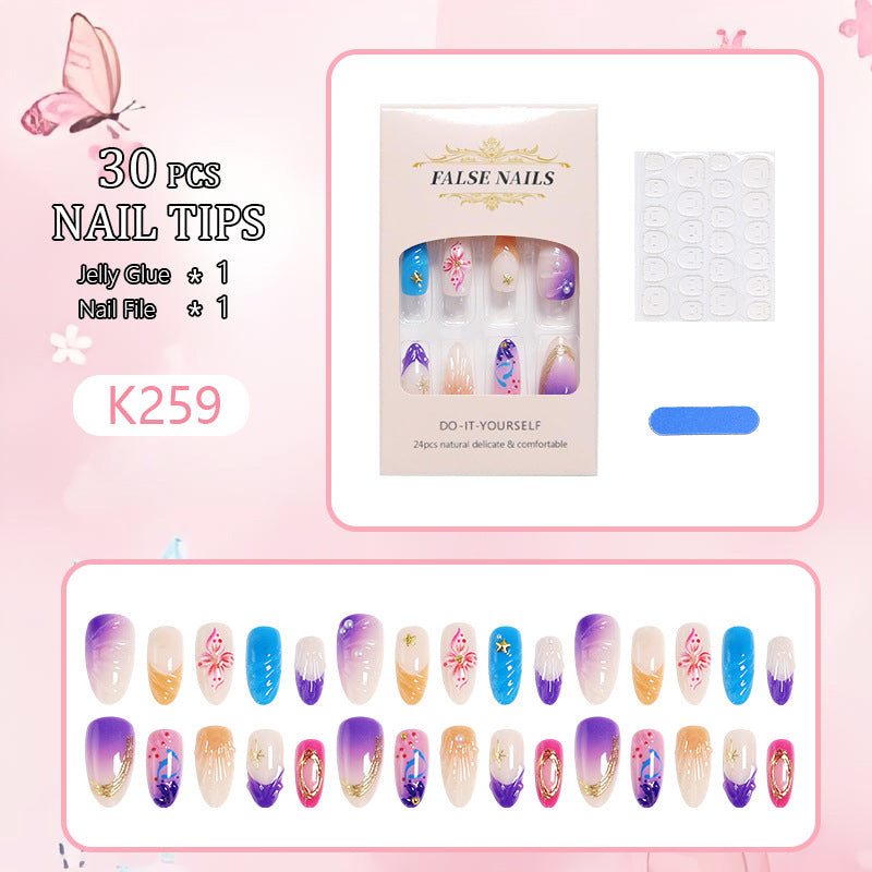 Creative nail art set with floral and glamorous embellishments Stornfield