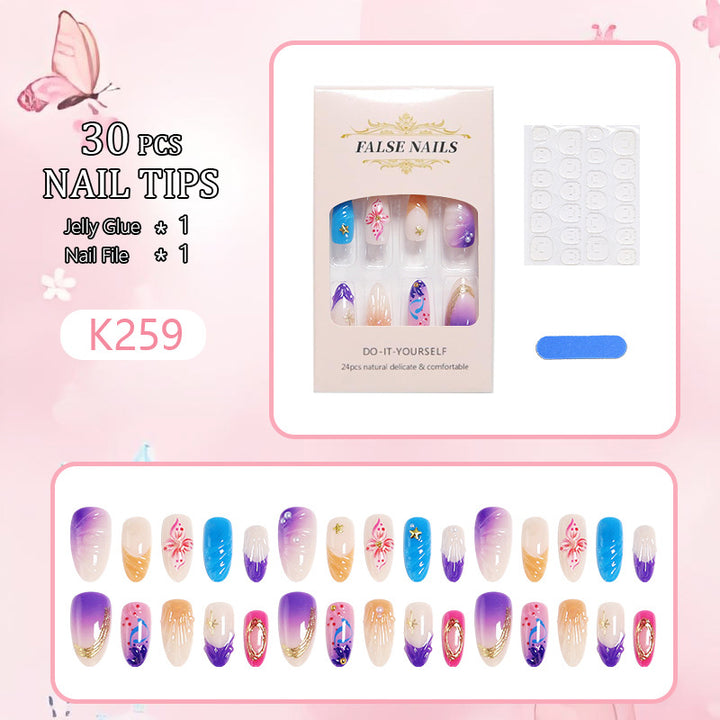 Creative nail art set with floral and glamorous embellishments Stornfield