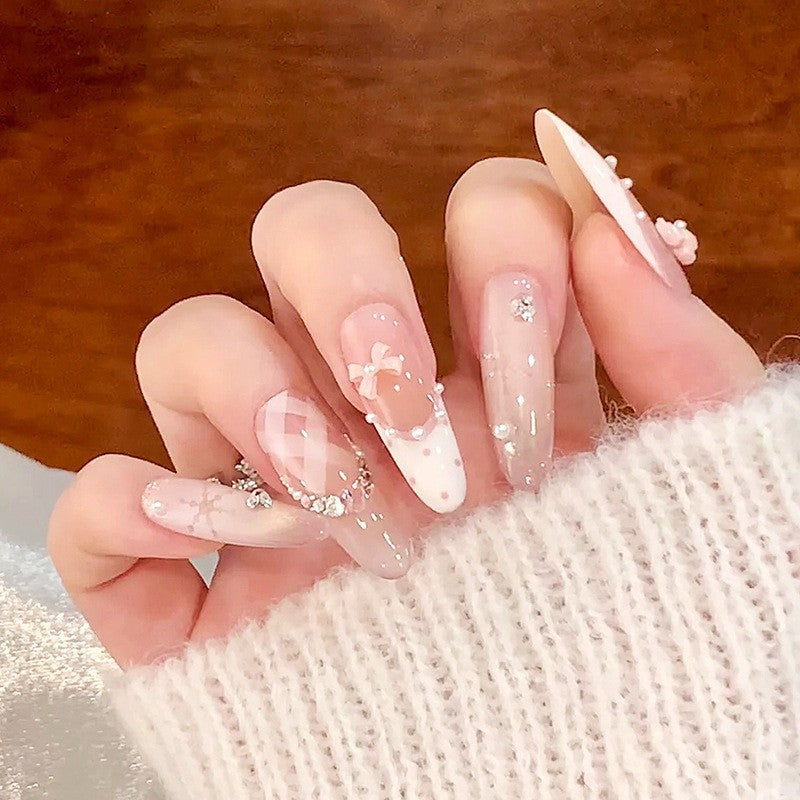 Artistic Nail Extensions with Decorative Elements Stornfield