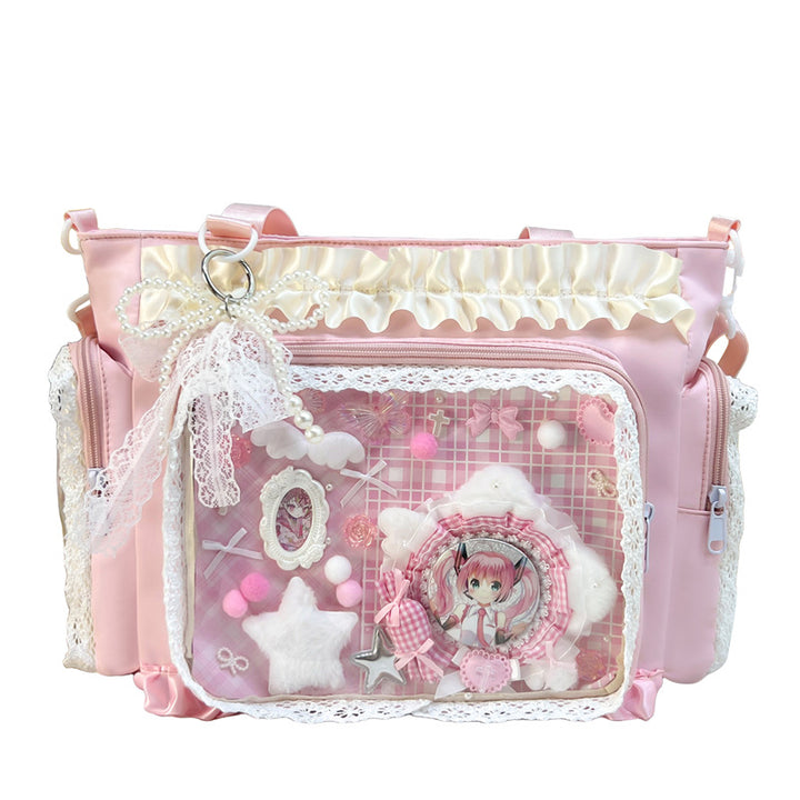 Shoulder bag with transparent front and playful applications Stornfield