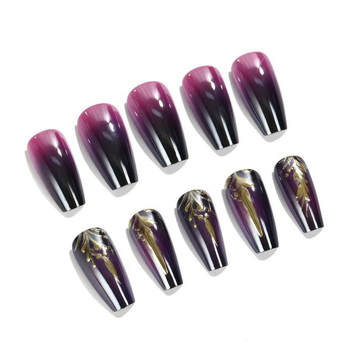 Artificial nails in elegant ombré design with gold accents Stornfield