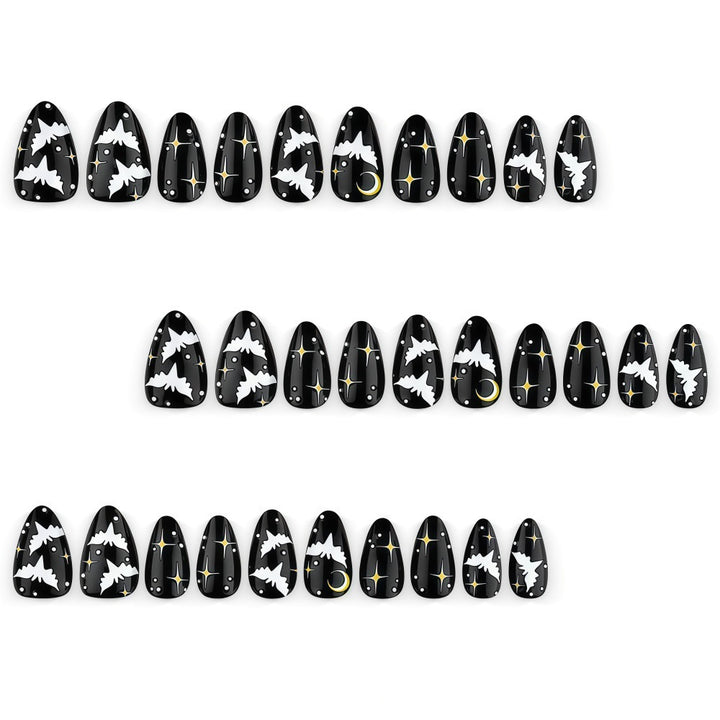 Artificial nails in creative Halloween bat design Stornfield