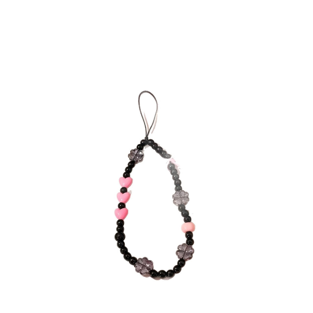Playful Heart and Flower Bead Phone Charm Stornfield