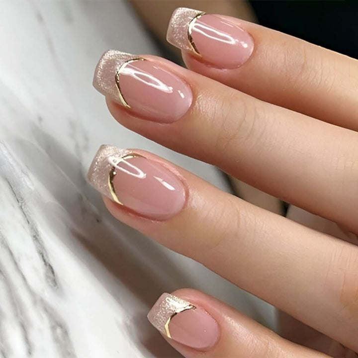 Artistic Nail Extensions with Glitter and Gold Details Stornfield