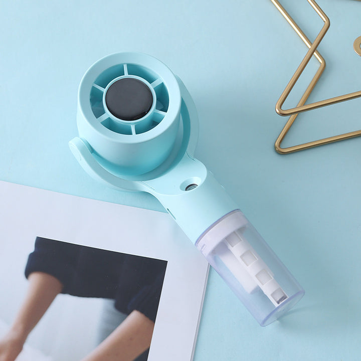 Cooling portable handheld misting fan with detachable water reservoir adjustable tilt and cute animal ears Stornfield
