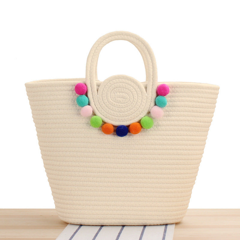 Playful beach bag with colorful pompom decor Stornfield