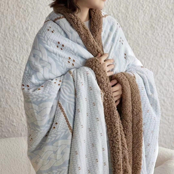 Cozy throw blanket with Sherpa lining and jacquard pattern