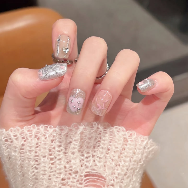 Decorative Press-On Nail Set with Heart and Silver Accents Stornfield