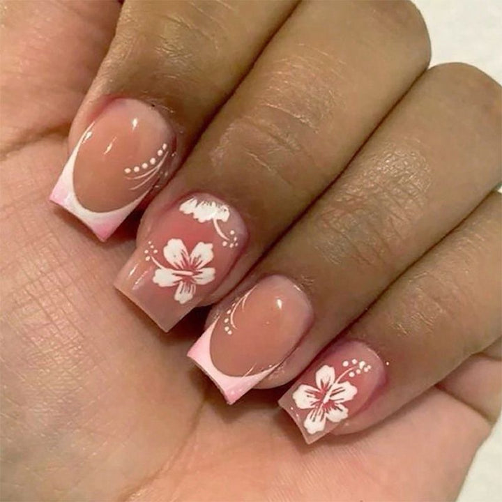Acrylic nail set with elegant flower and French tip designs Stornfield