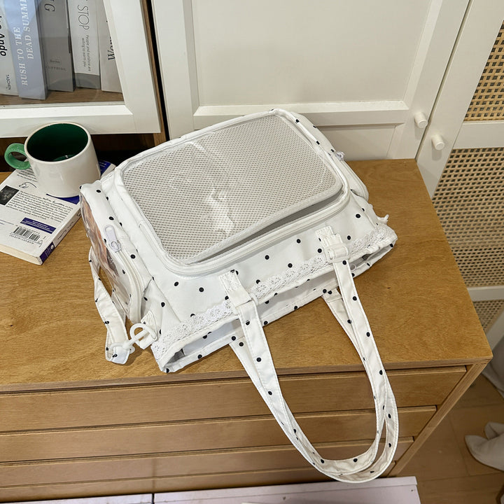 Handbag with Transparent Compartment Division and Playful Application Design Stornfield