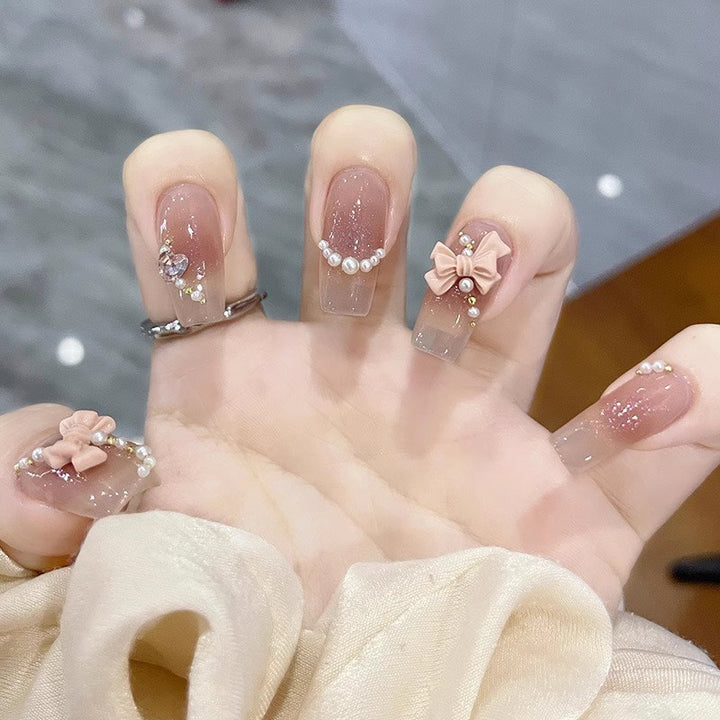 Glamorous artificial nails with moon and star motif Stornfield