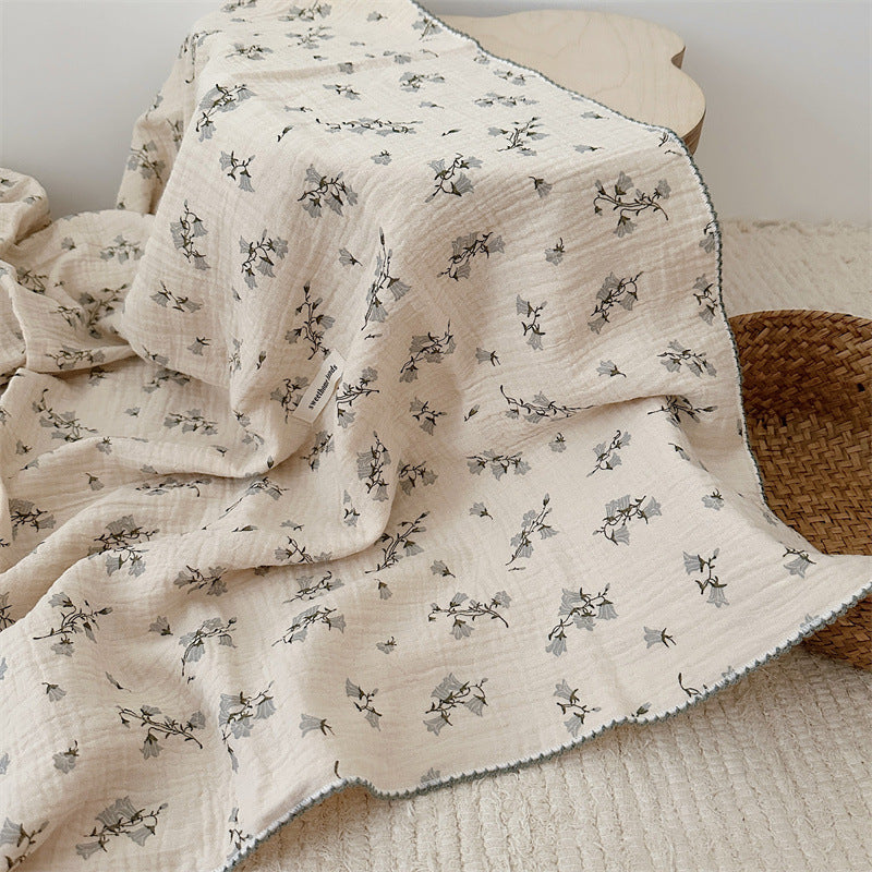 Unisex Muslin Blanket with delicate floral design and elegant ruffles Stornfield