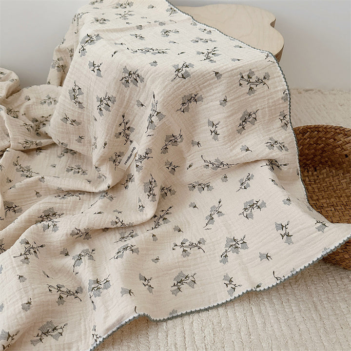 Unisex Muslin Blanket with delicate floral design and elegant ruffles Stornfield