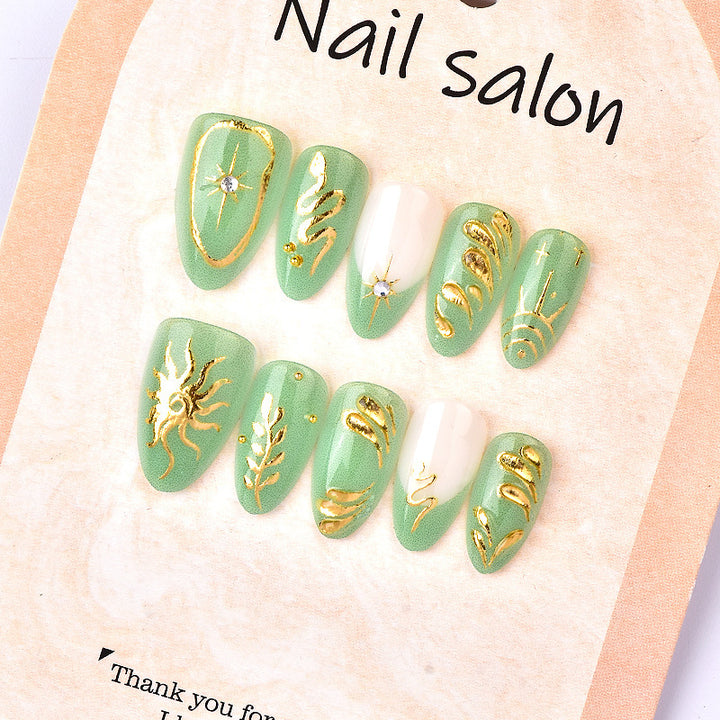 Artificial nails with elegant gold design Stornfield