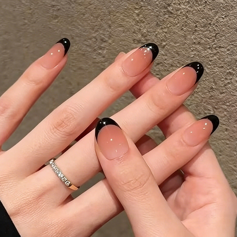 Acrylic nail set with elegant French tip and shimmering accents Stornfield