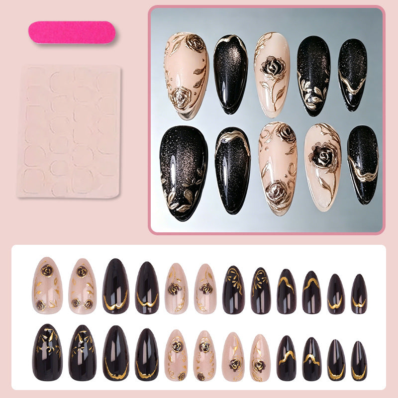 Nail set with elegant gold embellishments and original patterns Stornfield