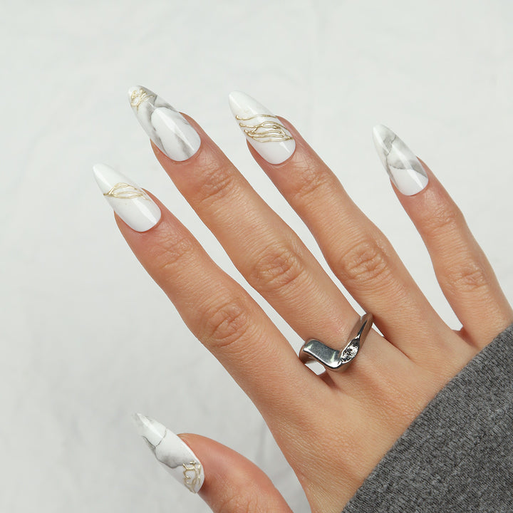 Elegant Stiletto Press-On Nails with Marble and Gold Accents Stornfield