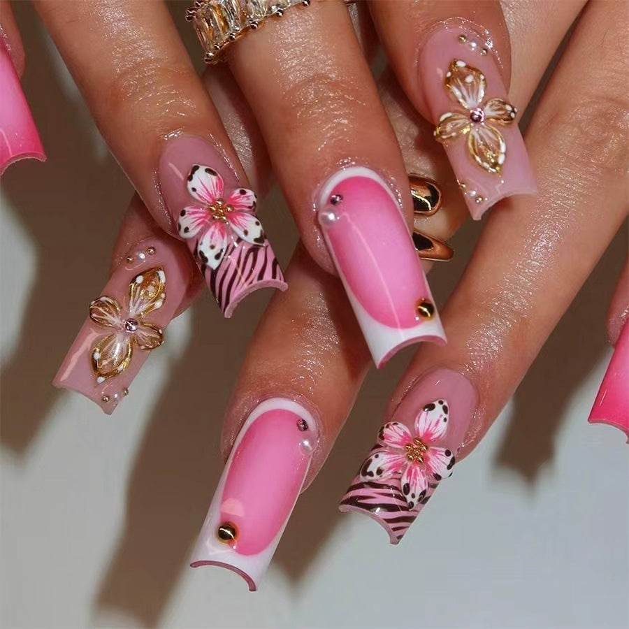 Artificial nail set with floral and glamorous decorations Stornfield