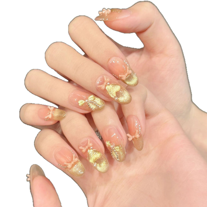Decorative Press-On Nail Art Set with Glittery French Tips and Floral Accents