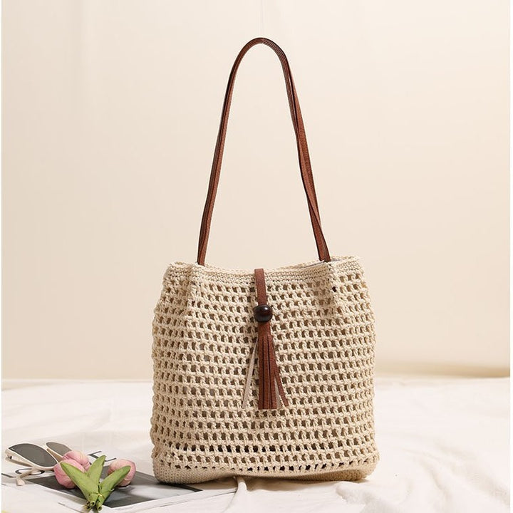 Hand-knotted basket bag with elegant leather handles Stornfield