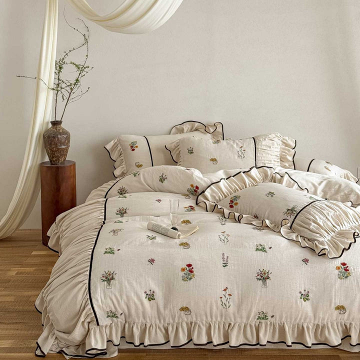 High-quality bed linen set made of linen-cotton blend with wildflower embroidery and ruffled hem