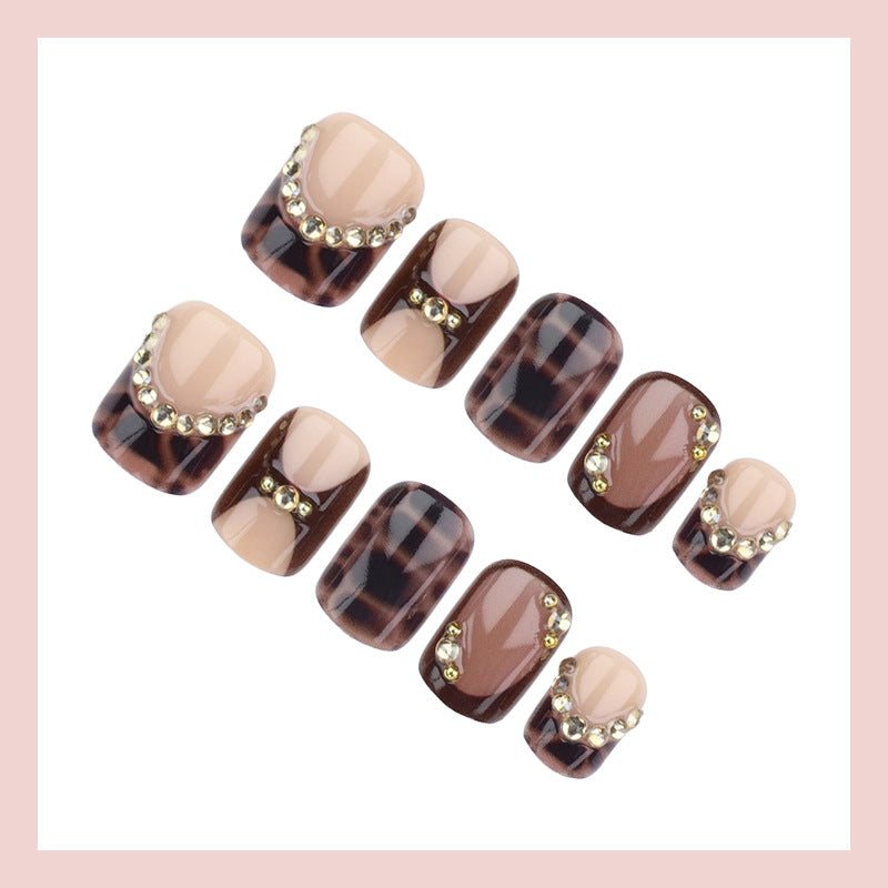Acrylic nail set with glamorous accents and elegant design Stornfield