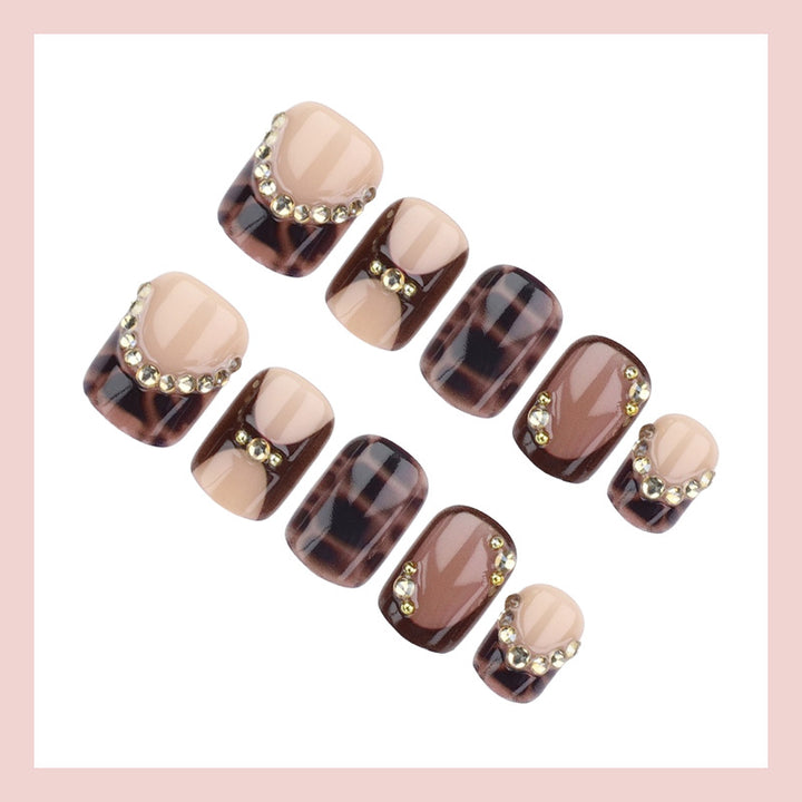 Acrylic nail set with glamorous accents and elegant design Stornfield