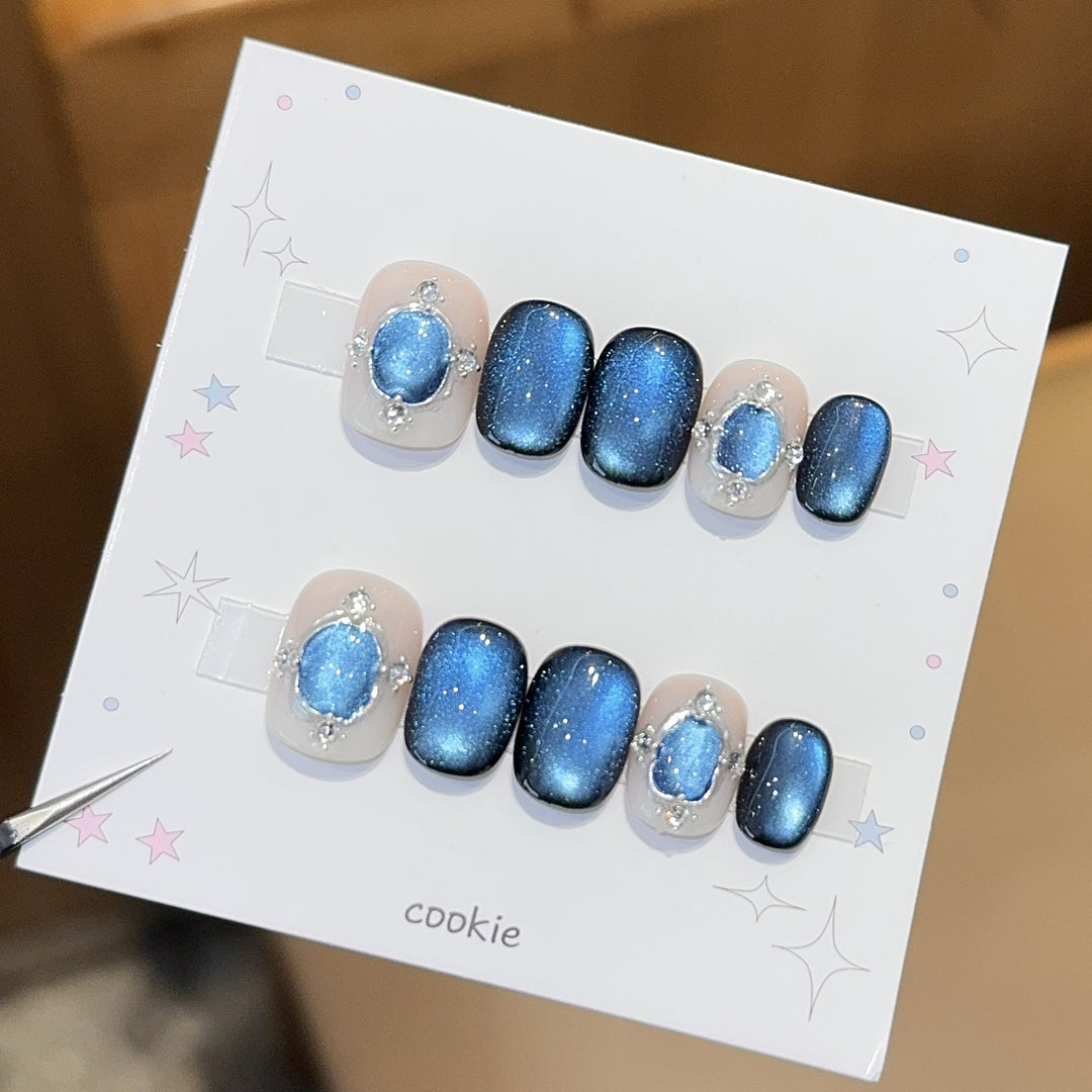 Glamorous artificial nails with shimmering star effect Stornfield