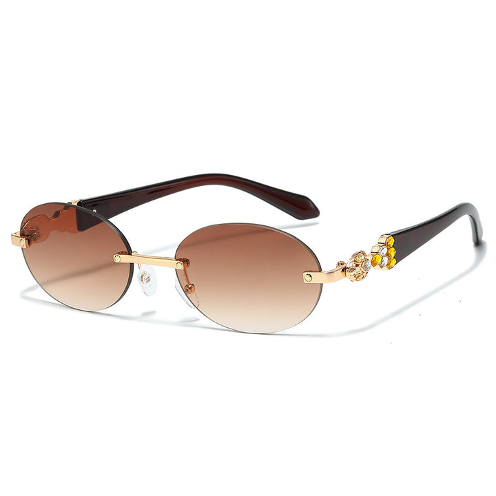 Fashion-Forward Decorative Oval Sunglasses Stornfield