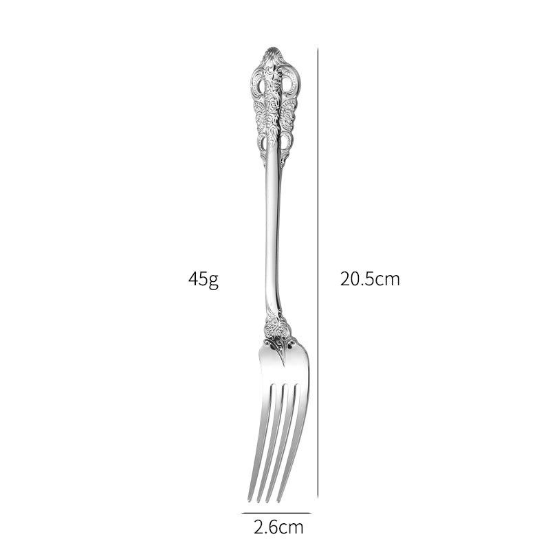 Elegant fish fork with artistic handle design Stornfield