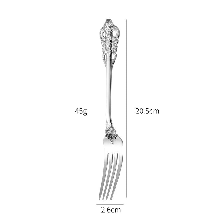 Elegant fish fork with artistic handle design Stornfield