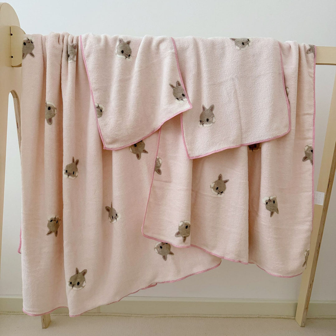 Cuddle blanket for baby and toddler with cute dog motif and soft microfleece